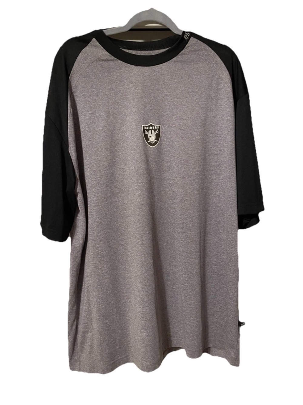 NFL Men's Grey and Black Short-Sleeve Raglan Shirt with Raiders Crest